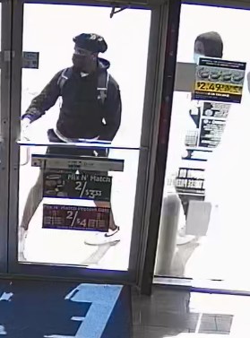 Camera photo of suspects entering store